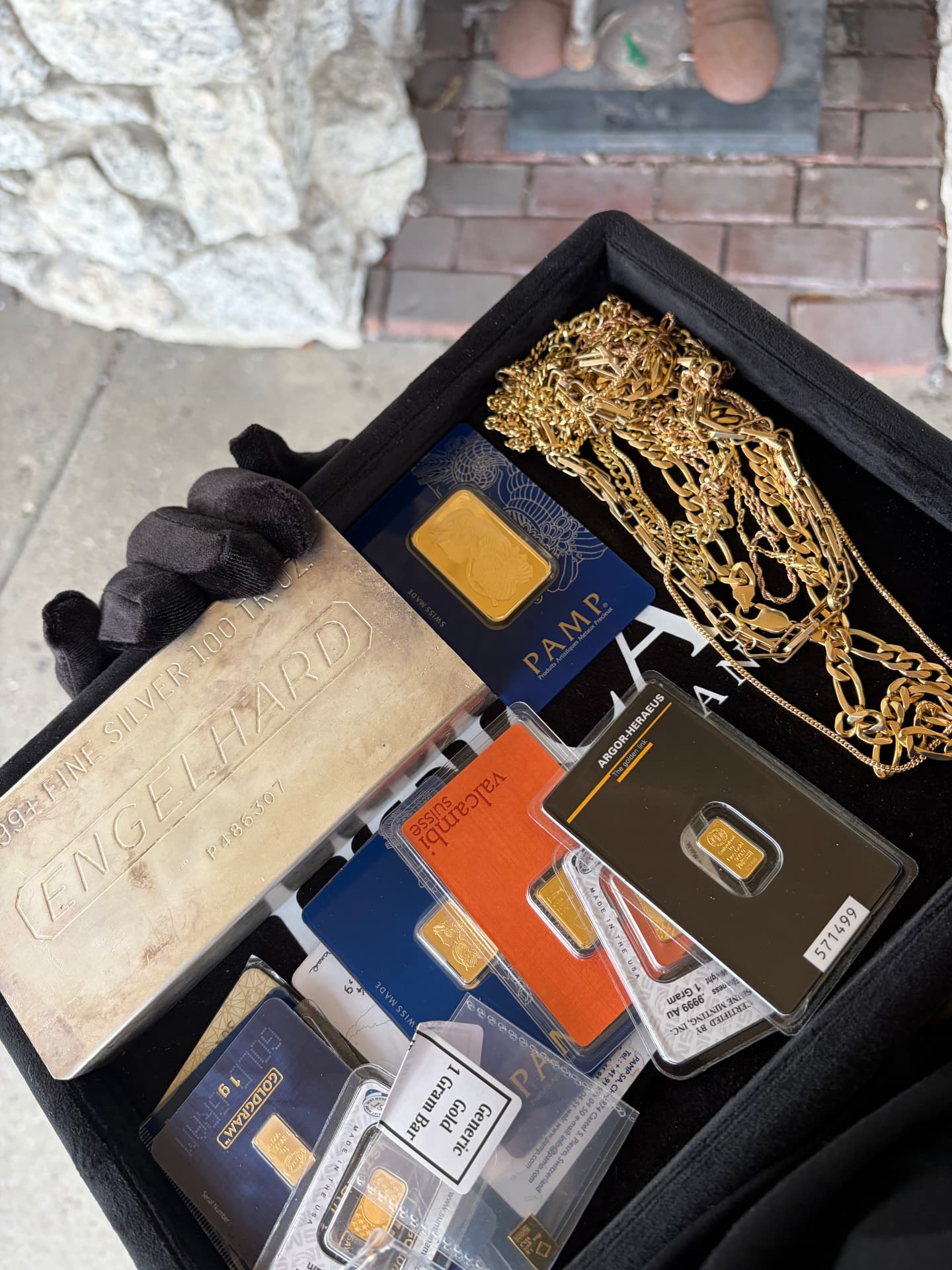 Gold bullion, silver bar and gold jewelry
